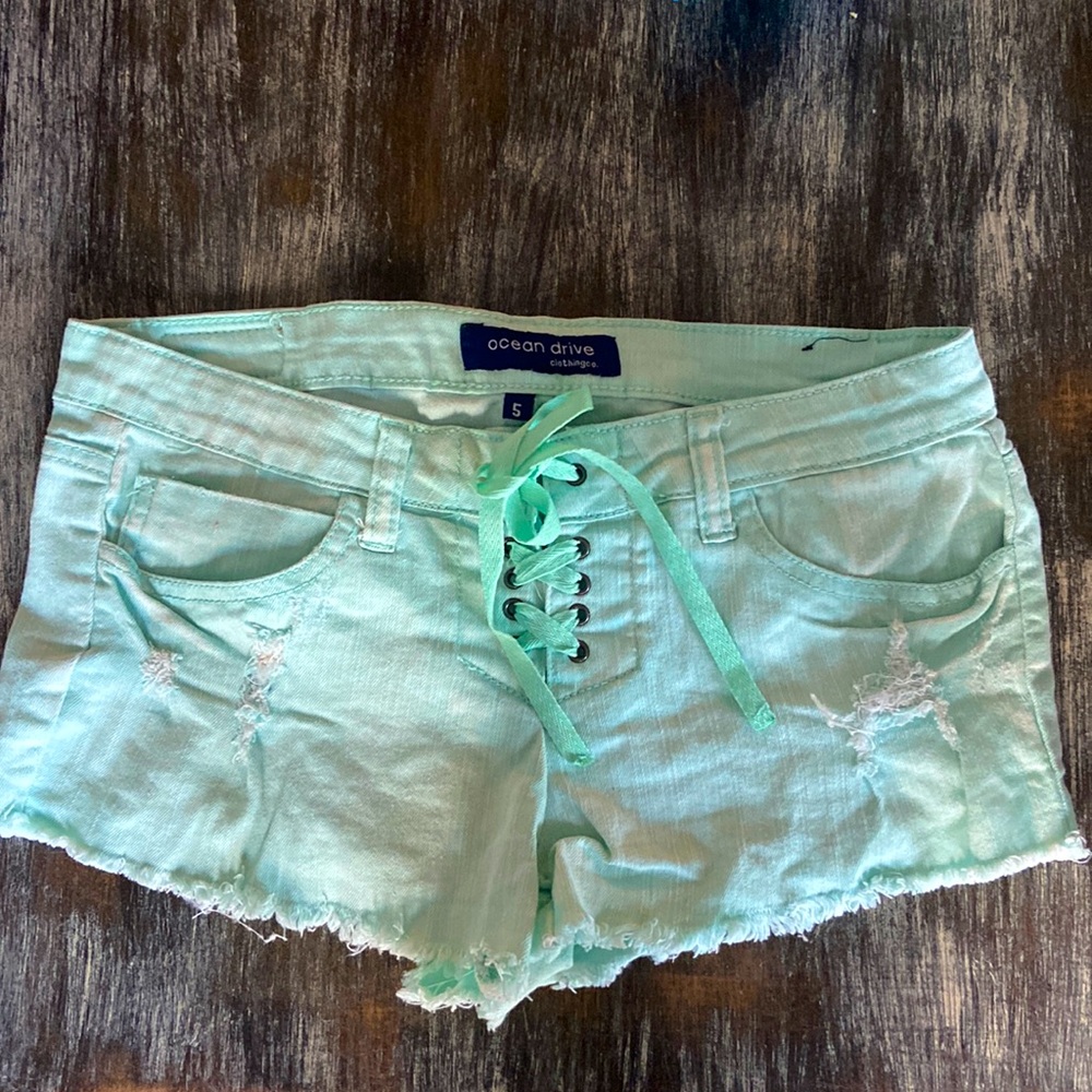 Teal jean shorts